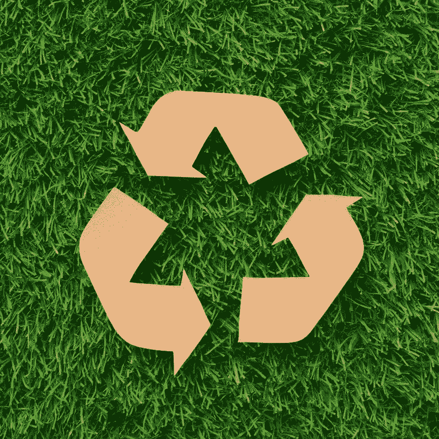 Simbolo del riciclo sull’erba