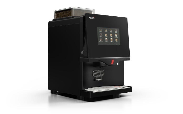 Macchina caffè solubile FTS 60 E lato sinistro su sfondo bianco.